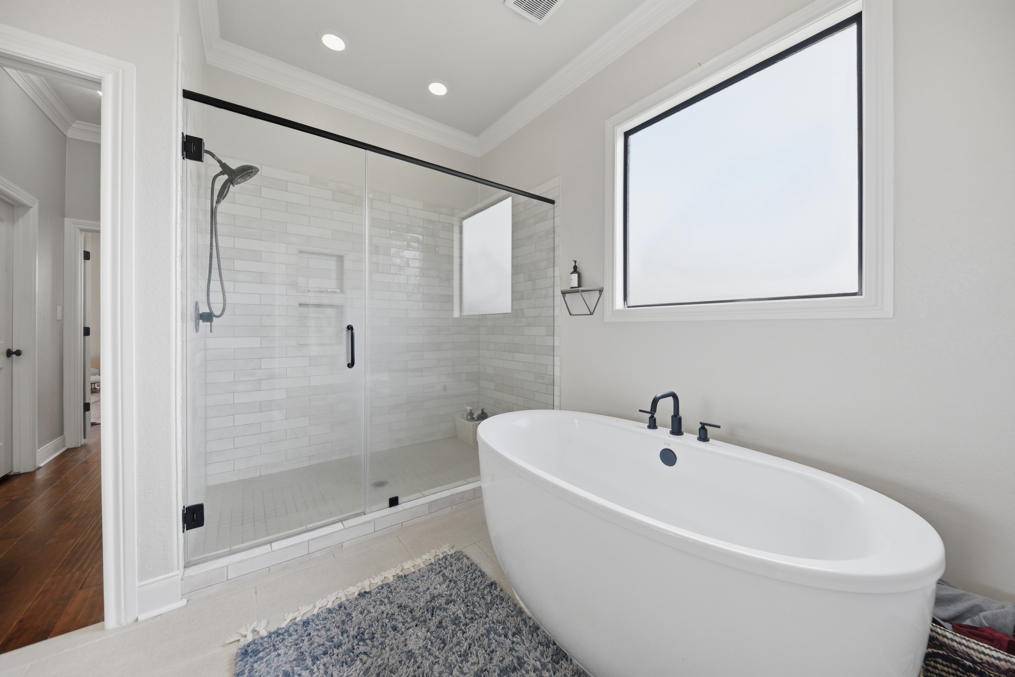 2245 Strangmeier Road Brenham, TX 77833 - Photo 26 of 40 With soaking tub and glass shower