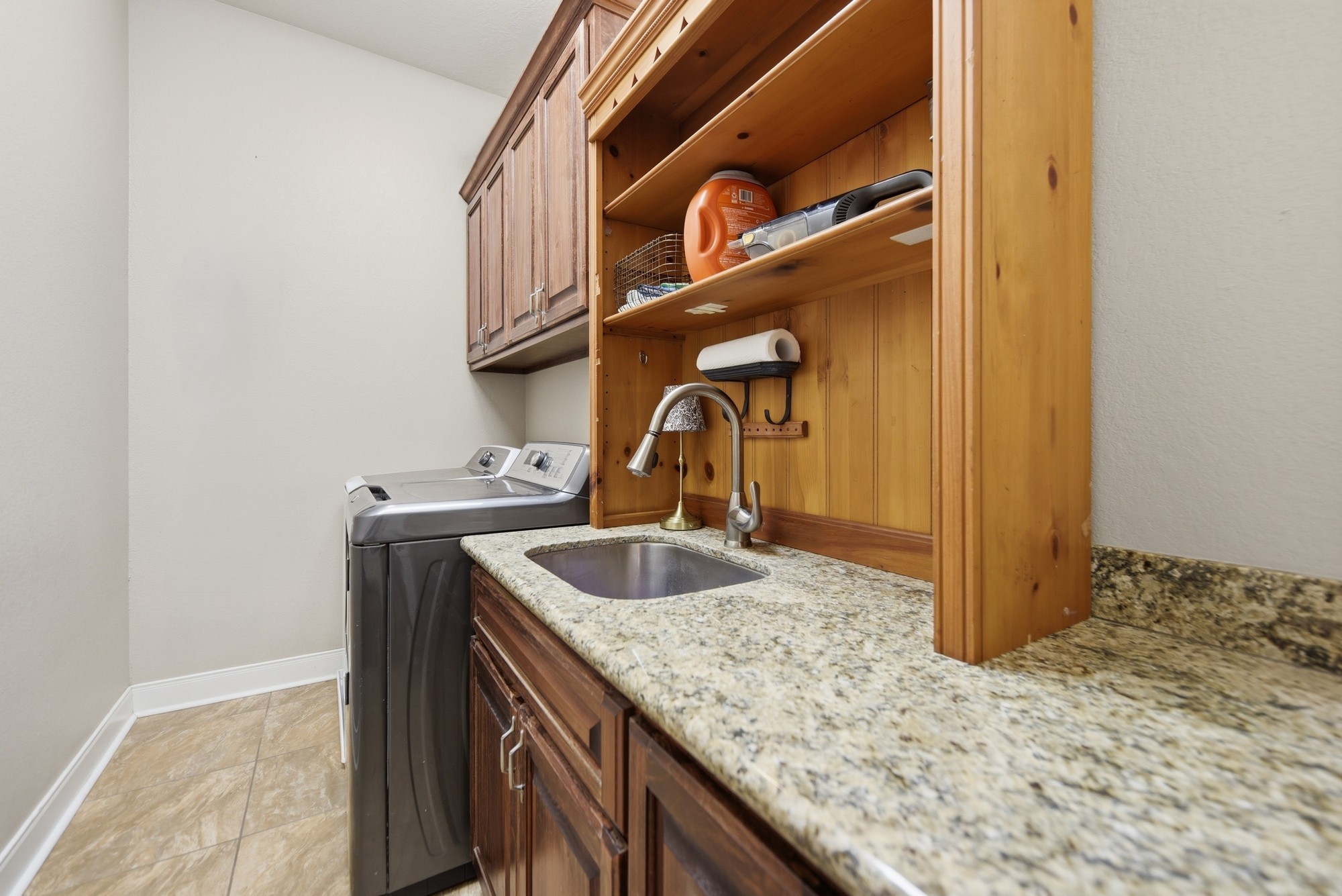 2245 Strangmeier Road Brenham, TX 77833 - Photo 35 of 40 Laundry Room with storage, counter space and sink.