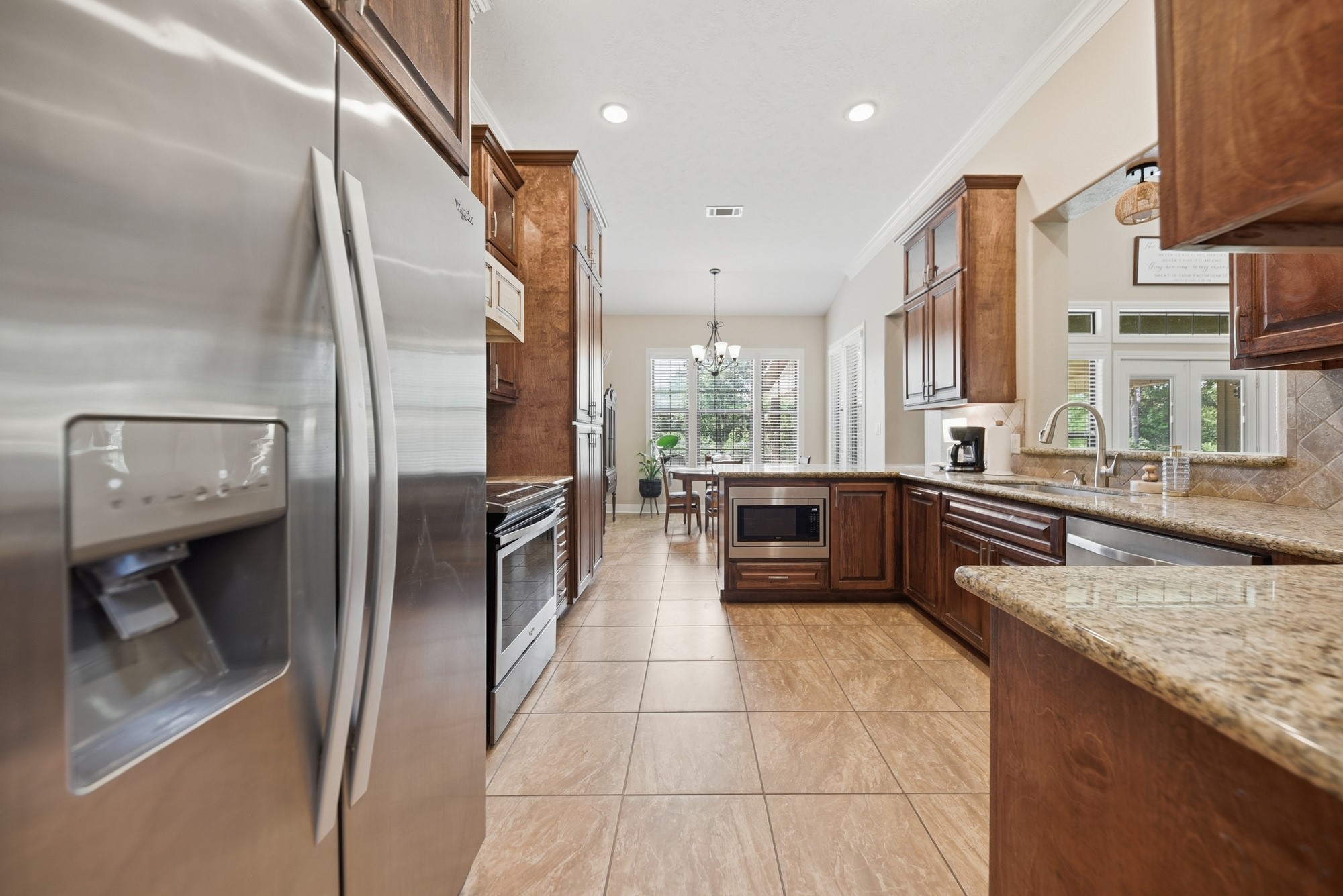 2245 Strangmeier Road Brenham, TX 77833 - Photo 4 of 40 Custom kitchen with ample cabinet and counter space.