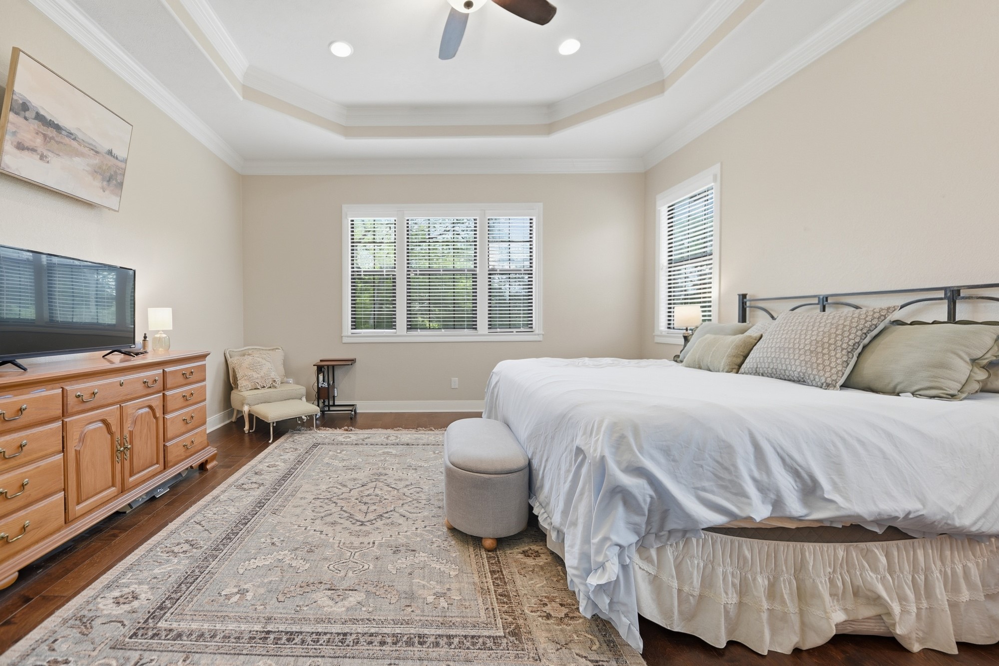 2245 Strangmeier Road Brenham, TX 77833 - Photo 5 of 40 The Primary Wing is separated from the rest of the home and features two walk in closets, a soaking tub and glass shower.