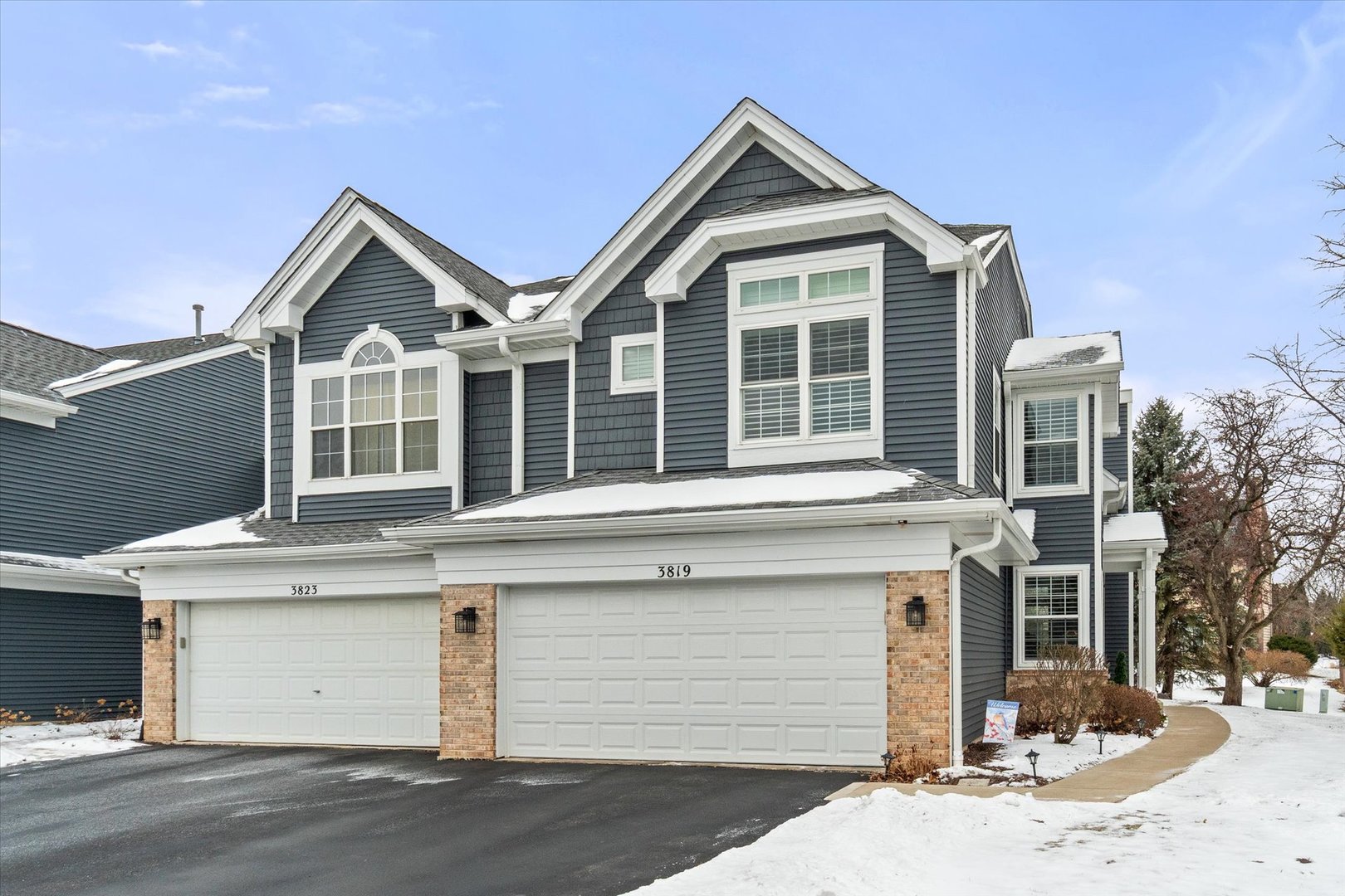 3819 Capri Court Naperville, IL 60564 - Photo 2 of 37 a front view of a house with a yard and garage