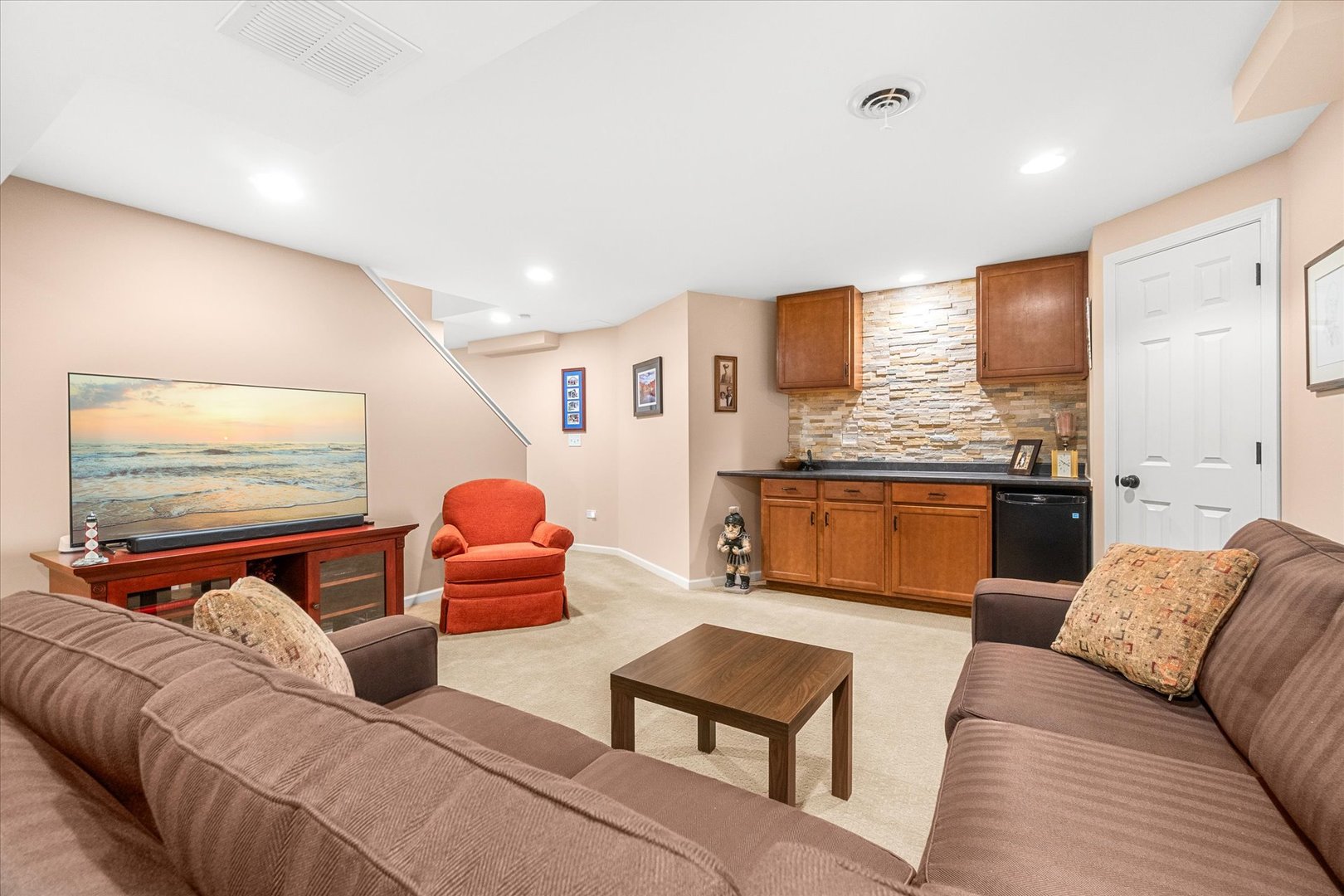 3819 Capri Court Naperville, IL 60564 - Photo 24 of 37 a living room with furniture and kitchen view