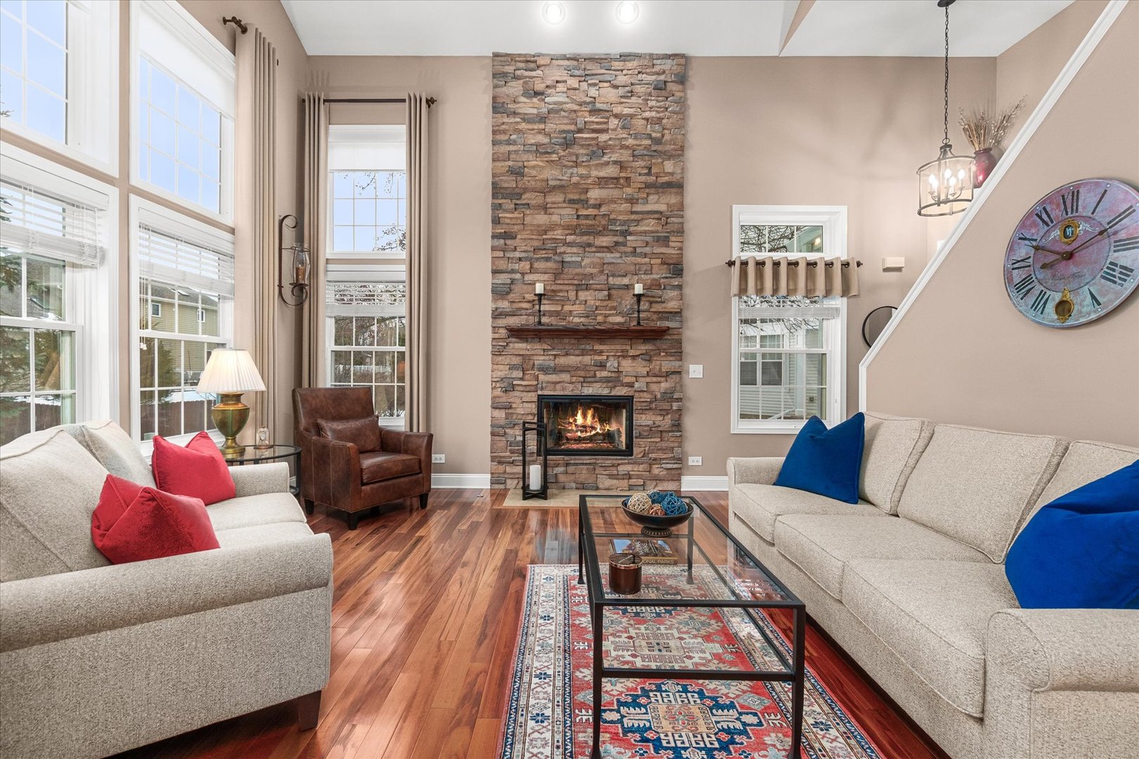 3819 Capri Court Naperville, IL 60564 - Photo 5 of 37 a living room with furniture and a fireplace