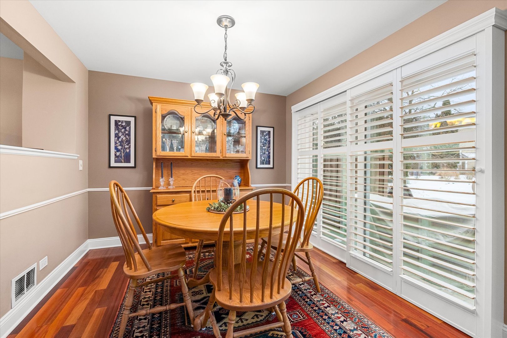 3819 Capri Court Naperville, IL 60564 - Photo 7 of 37 a view of a dining room with furniture window and wooden floor