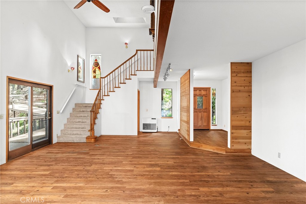 14243 Wycliff Way Magalia, CA 95954 - Photo 11 of 65 a view of empty room with wooden floor and fan
