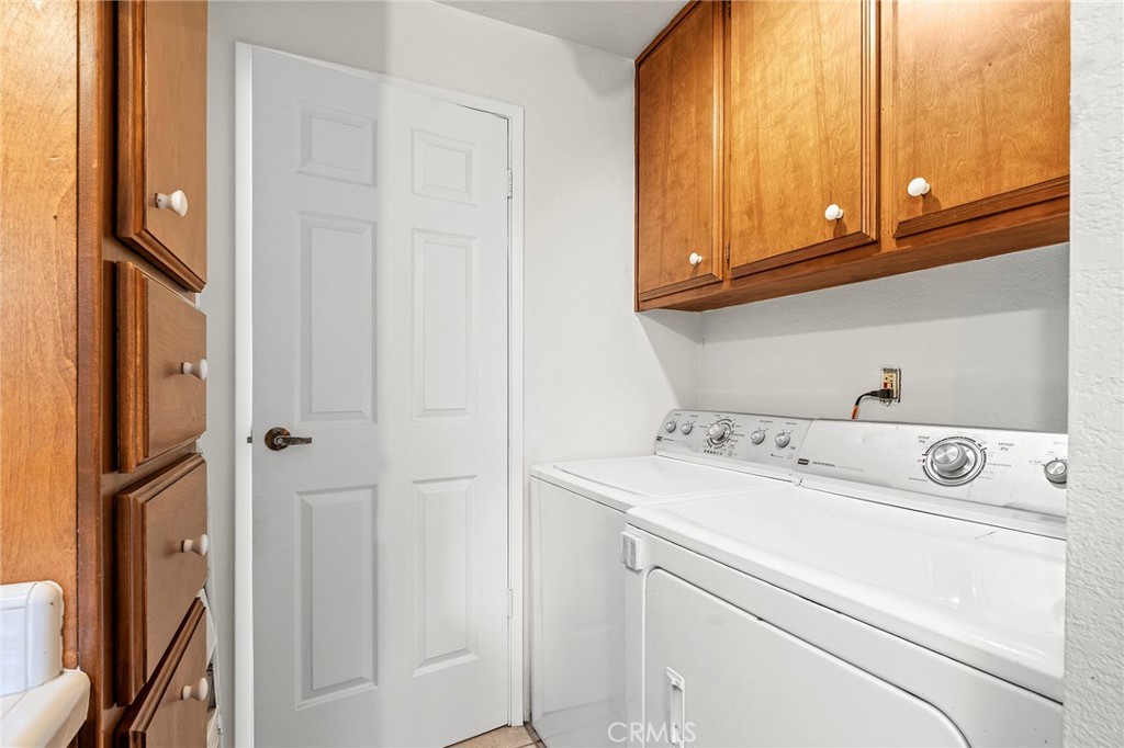 14243 Wycliff Way Magalia, CA 95954 - Photo 19 of 65 a utility room with dryer and washer