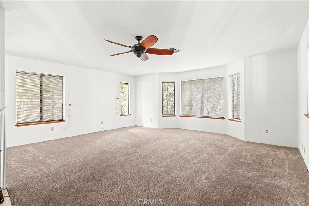 14243 Wycliff Way Magalia, CA 95954 - Photo 23 of 65 a view of an empty room with a window