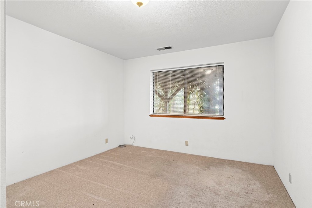 14243 Wycliff Way Magalia, CA 95954 - Photo 35 of 65 an empty room with window
