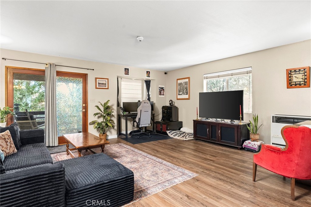 14243 Wycliff Way Magalia, CA 95954 - Photo 47 of 65 a living room with furniture and a flat screen tv