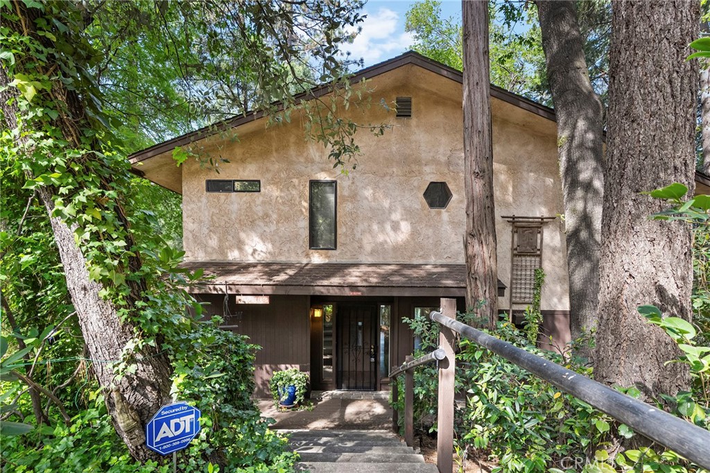 14243 Wycliff Way Magalia, CA 95954 - Photo 6 of 65 a front view of house with yard and trees around