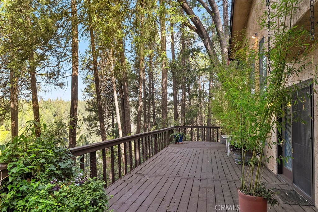 14243 Wycliff Way Magalia, CA 95954 - Photo 10 of 65 a view of balcony with wooden floor and fence