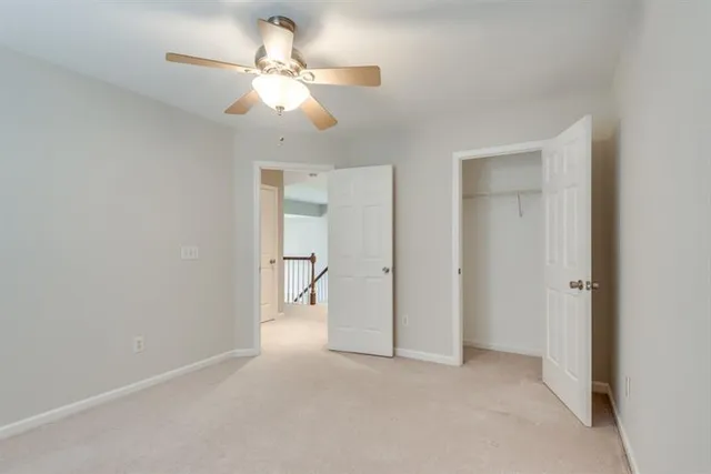 a view of a hallway with a room