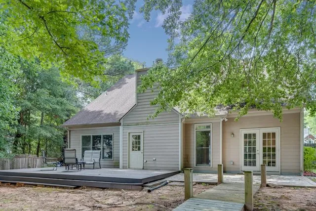 a view of a park with large trees