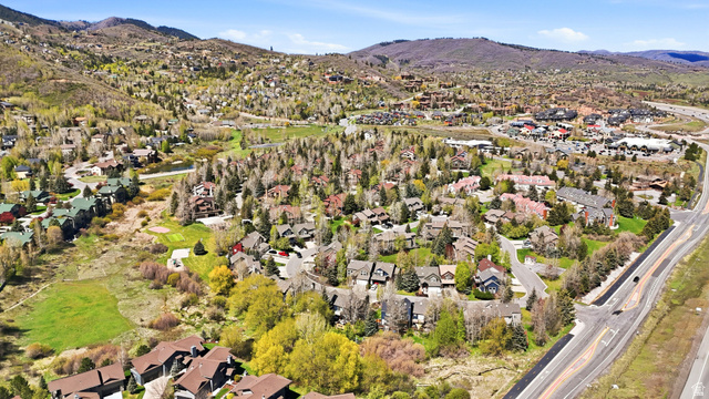 7935 Mustang Loop Road Park City, UT 84098 - Photo 59 of 60 Expansive aerial showcasing a mountainous landscape with residential developments and established roadways