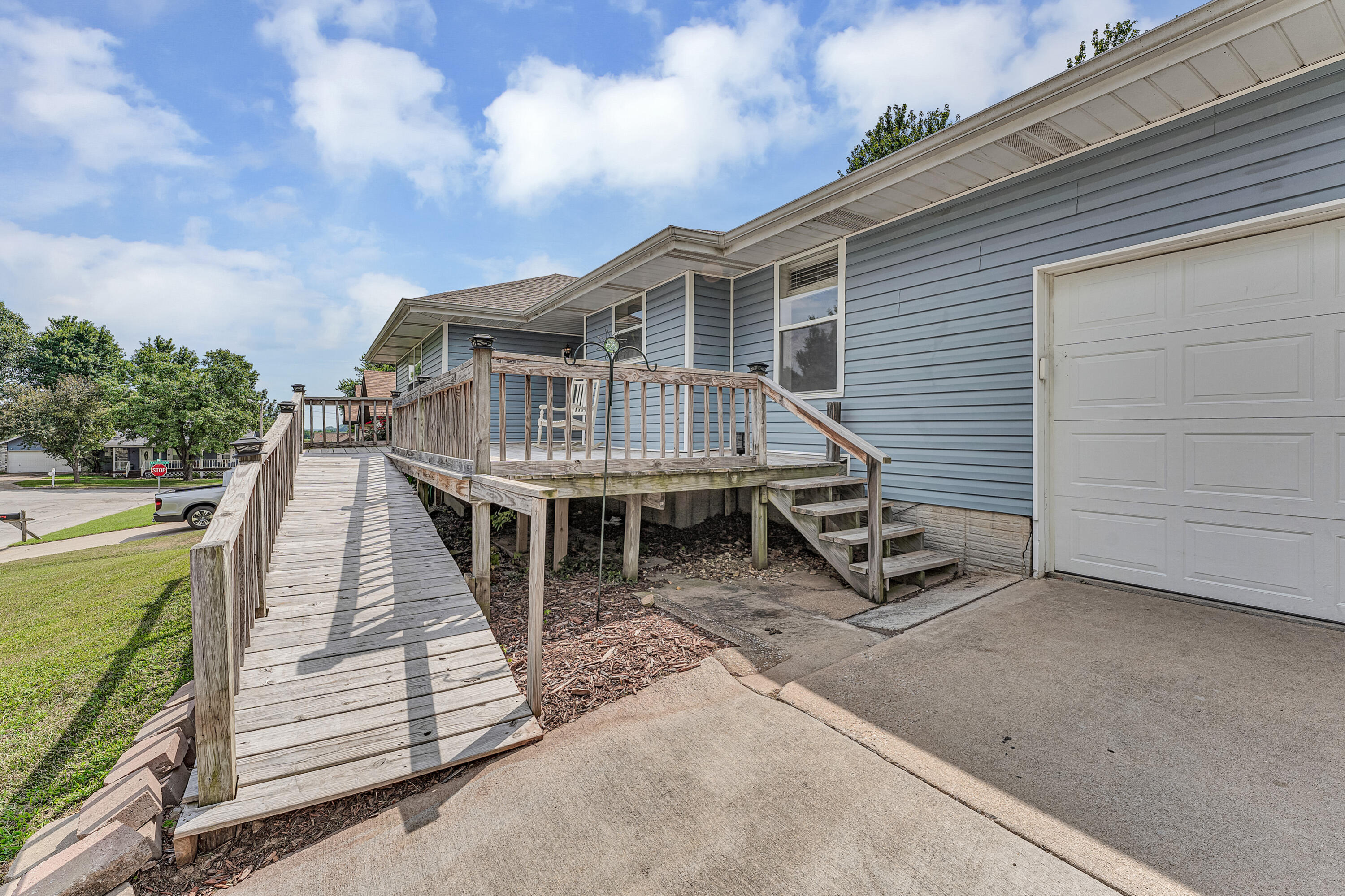 711 Rice Street Nixa, MO 65714 - Photo 2 of 39 Front deck and Stairs