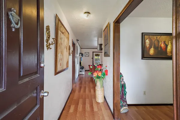 a view of entryway with flower pots