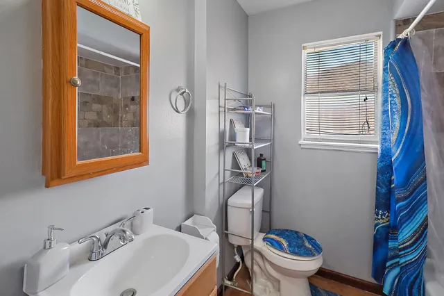 a bathroom with a sink and a toilet