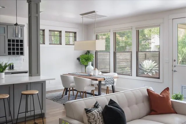 a living room with furniture and windows