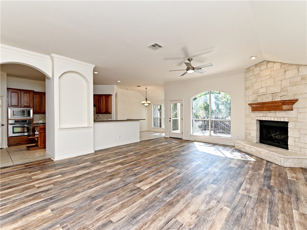 7909 Cobblestone Austin, TX 78735 - Photo 3 of 12 Living room / dining room open to kitchen
