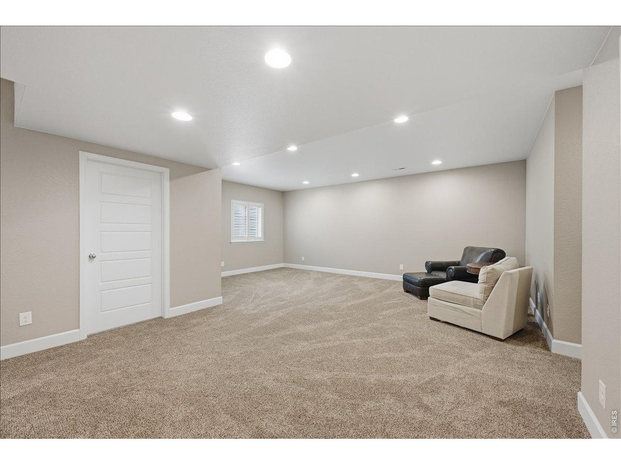 6096 Story Road Timnath, CO 80547 - Photo 35 of 50 a living room with furniture and white walls
