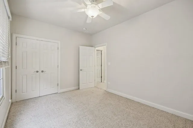 a view of a building with a yard