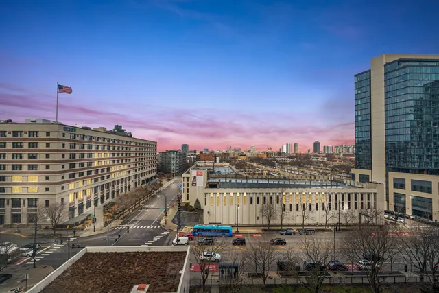 a view of a city with tall buildings