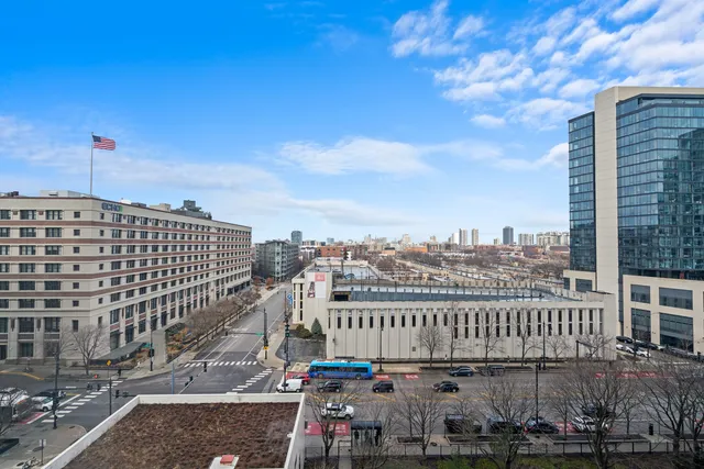 a view of a city with tall buildings