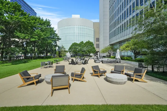 a view of a patio with a yard