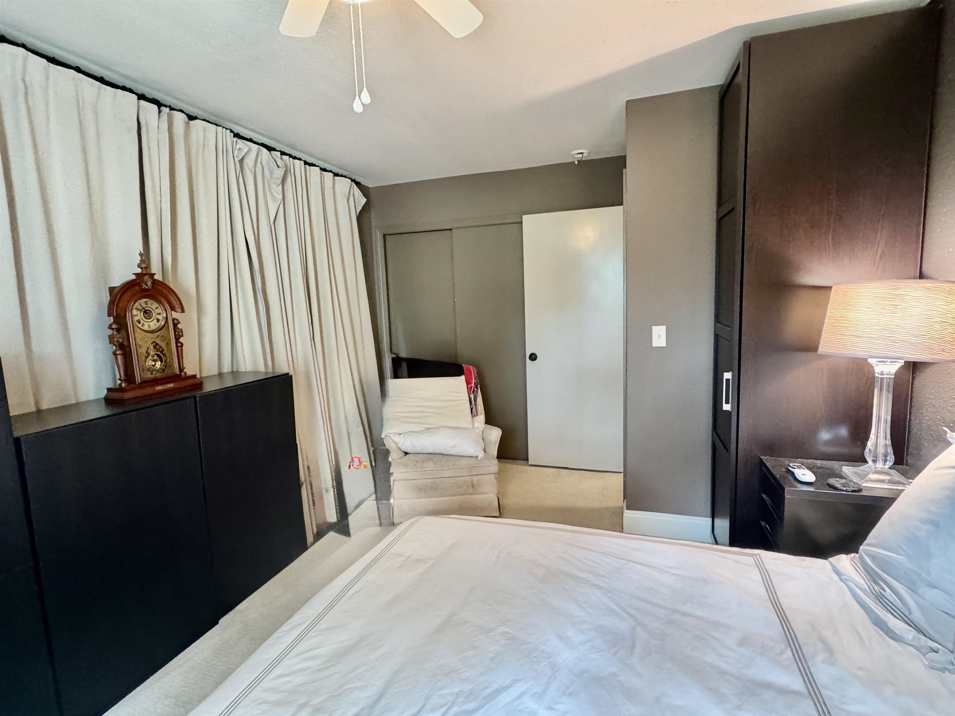 402 Laurel Lane Burnet, TX 78611 - Photo 21 of 30 a bedroom with a bed and a mirror