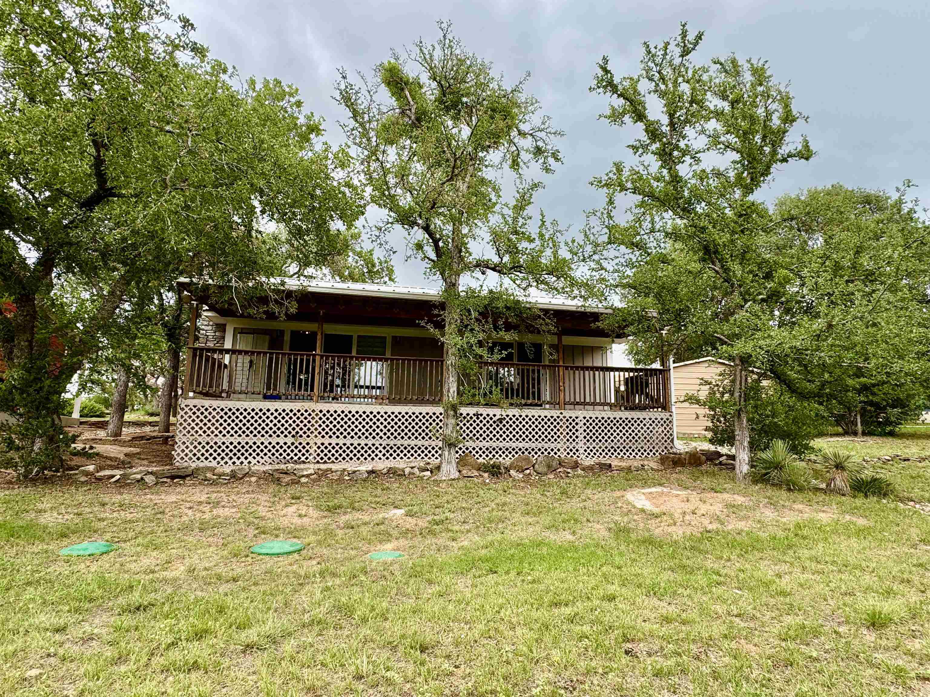 402 Laurel Lane Burnet, TX 78611 - Photo 8 of 30 a front view of a house with a yard