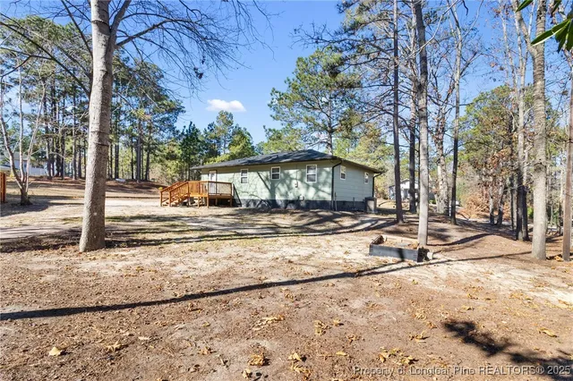 a house view with a outdoor space