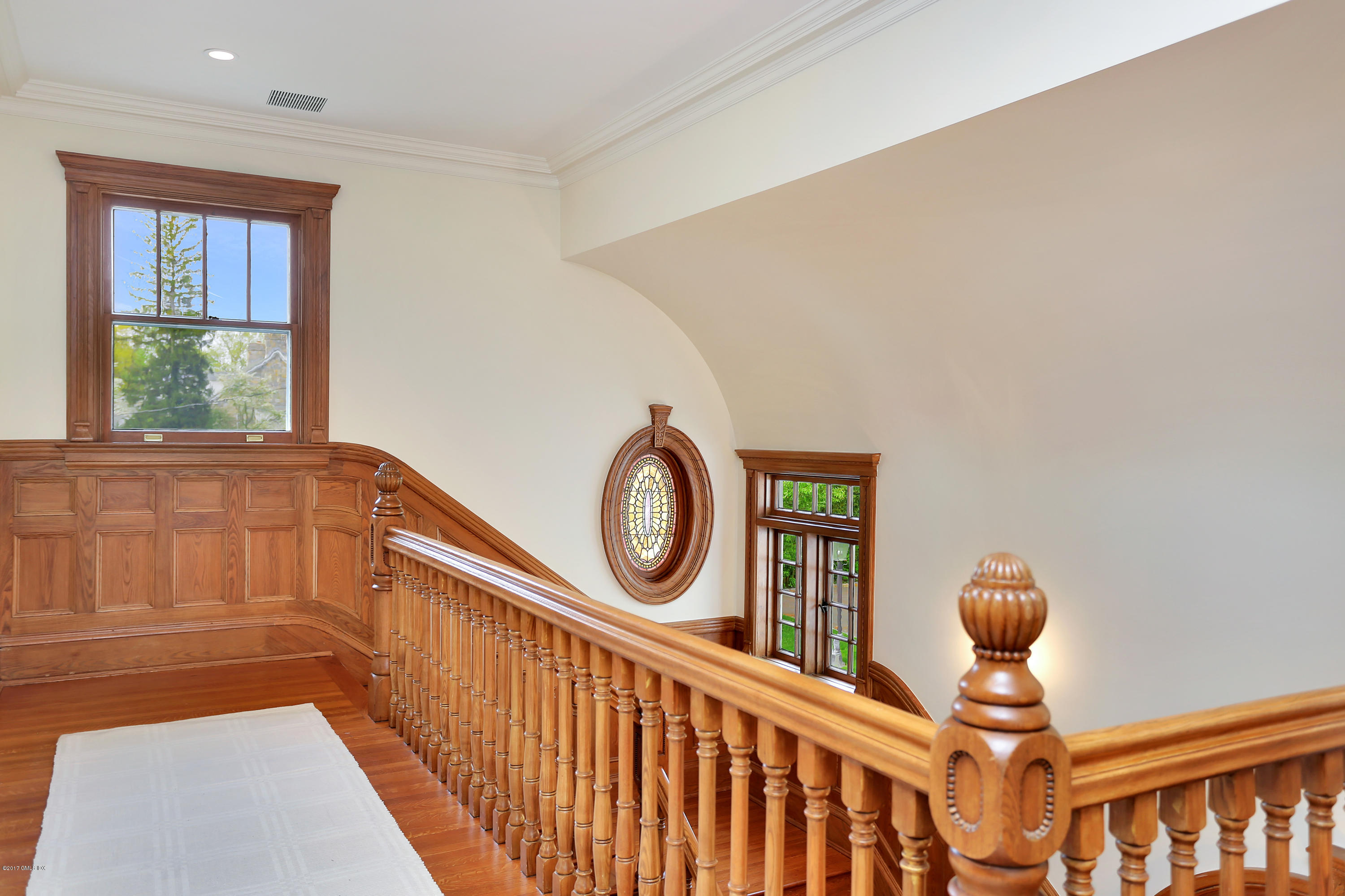 96 Club Road Riverside, CT 06878 - Photo 15 of 33 a view of a hallway with entryway wooden floor and front door