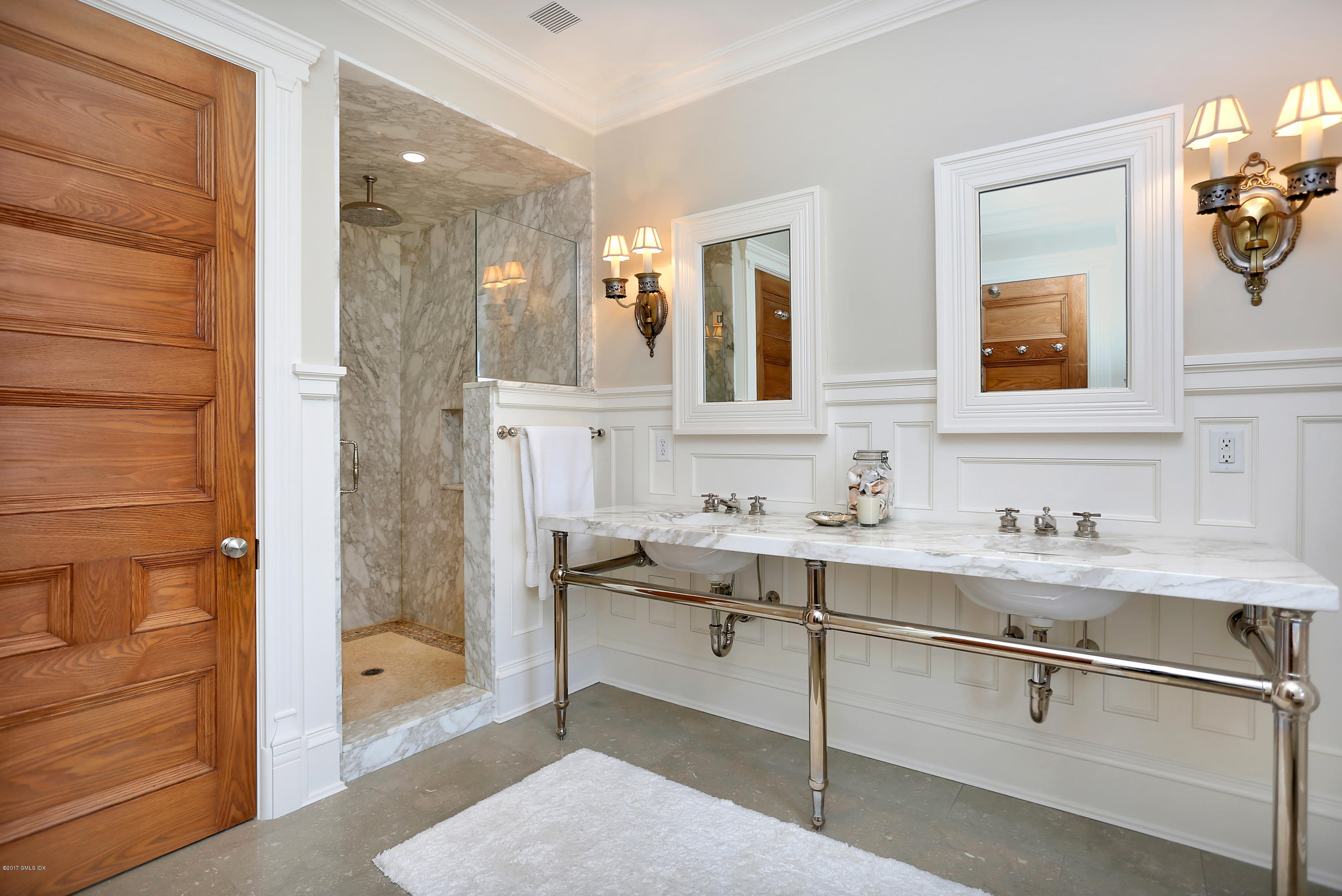 96 Club Road Riverside, CT 06878 - Photo 17 of 33 a bathroom with a sink and a mirror