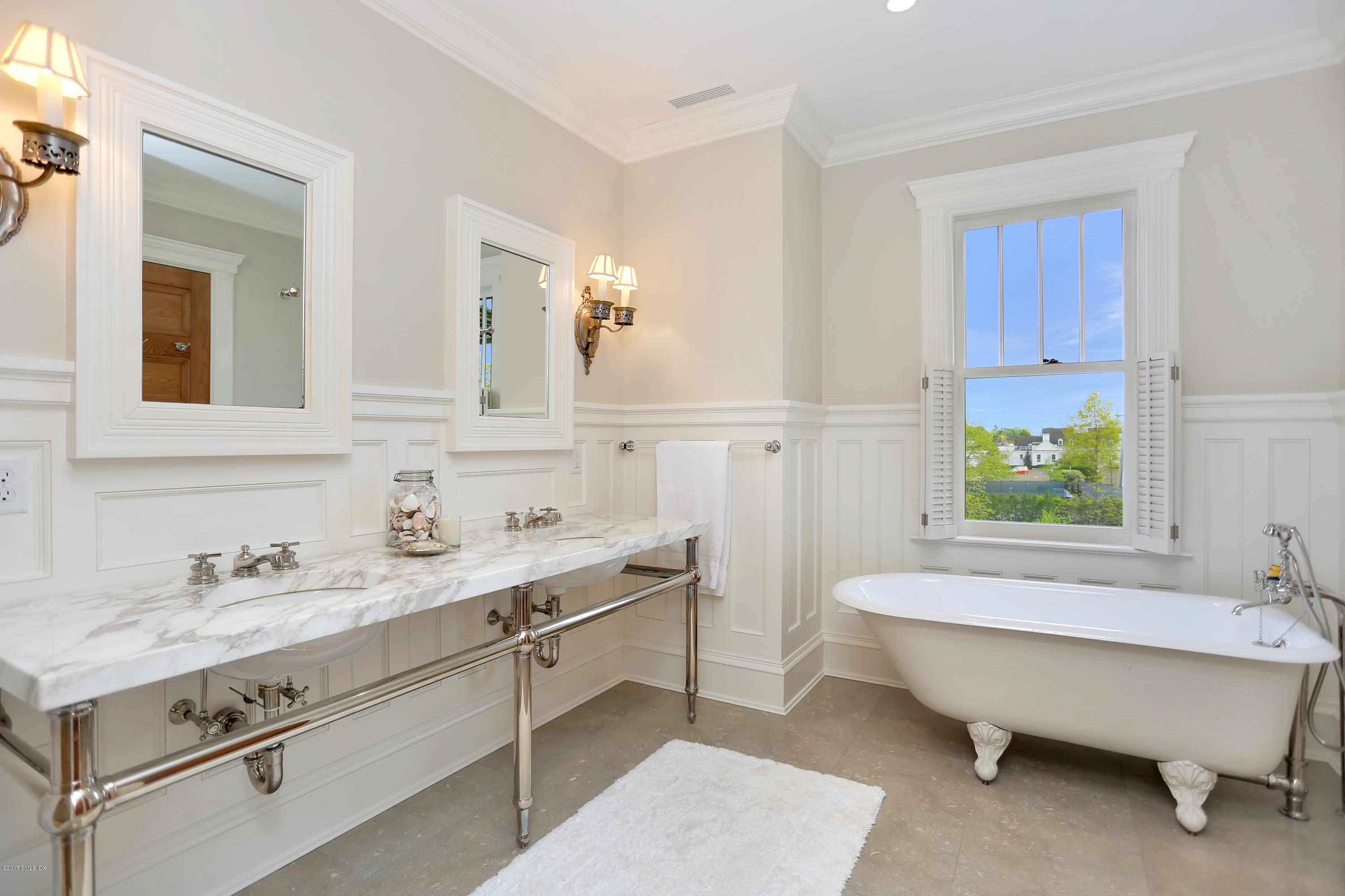 96 Club Road Riverside, CT 06878 - Photo 18 of 33 a bathroom with a tub sink and mirror