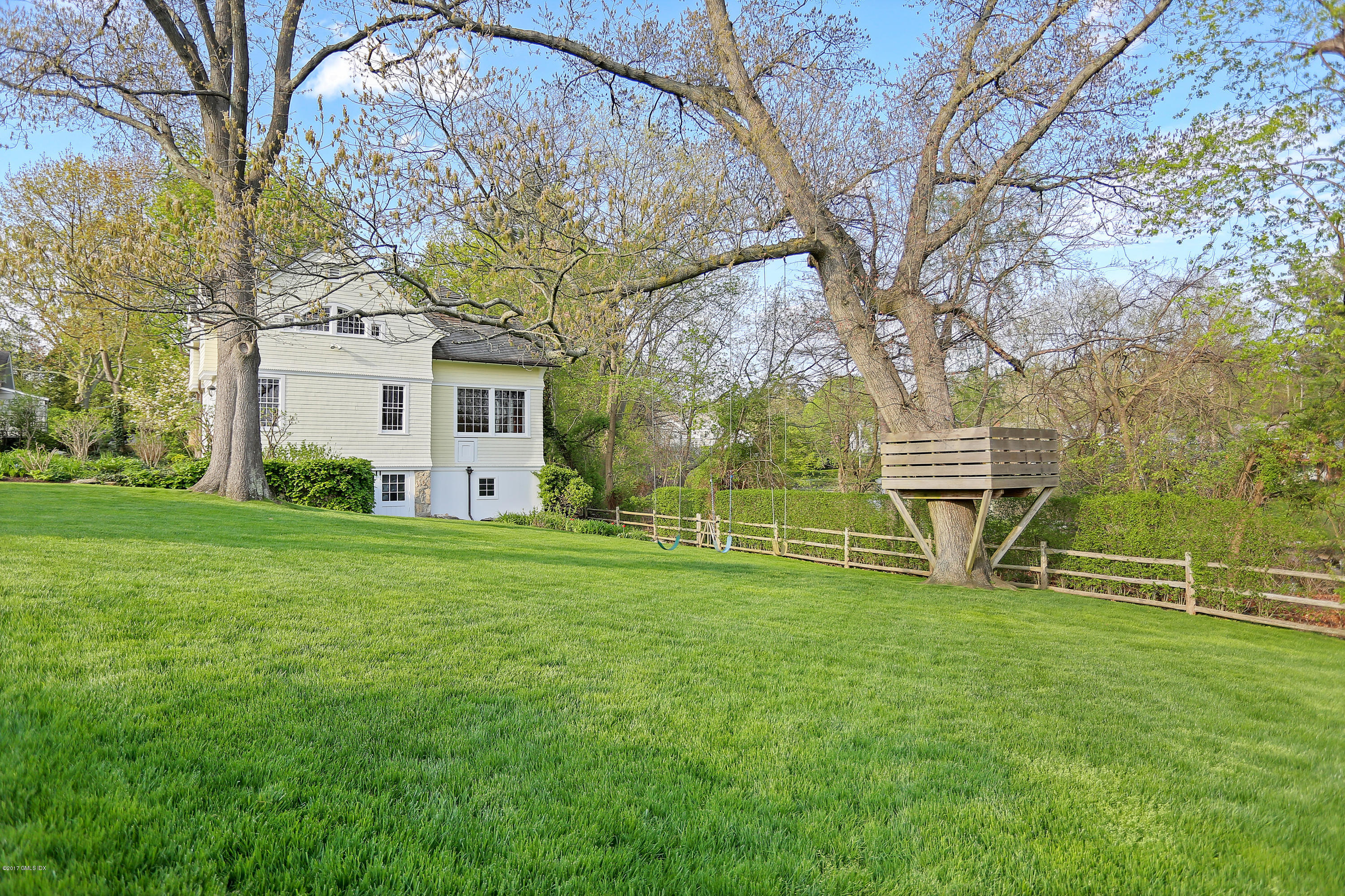96 Club Road Riverside, CT 06878 - Photo 27 of 33 a view of a house with a backyard