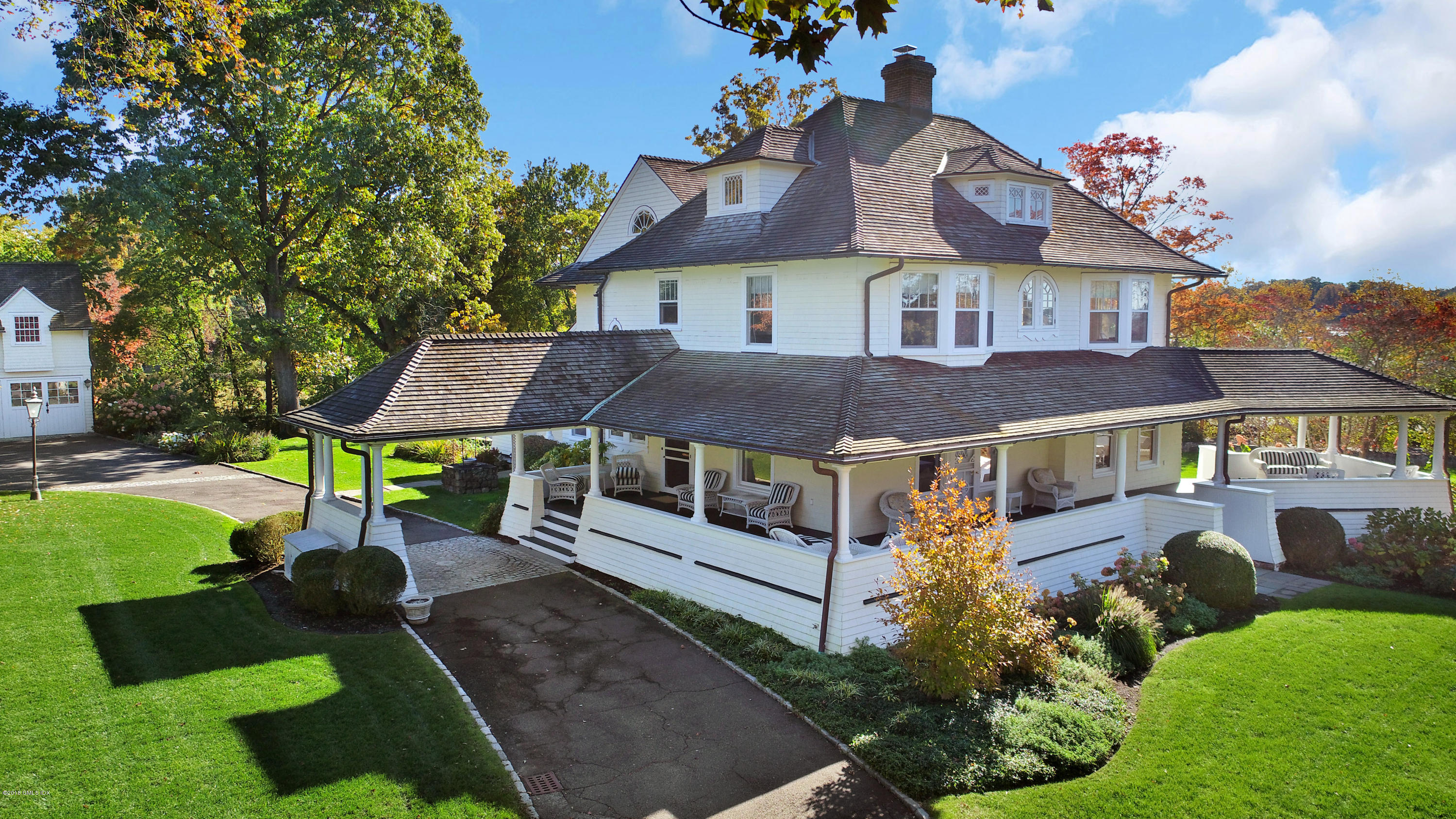 96 Club Road Riverside, CT 06878 - Photo 3 of 33 a aerial view of a house with a yard garden and outdoor seating
