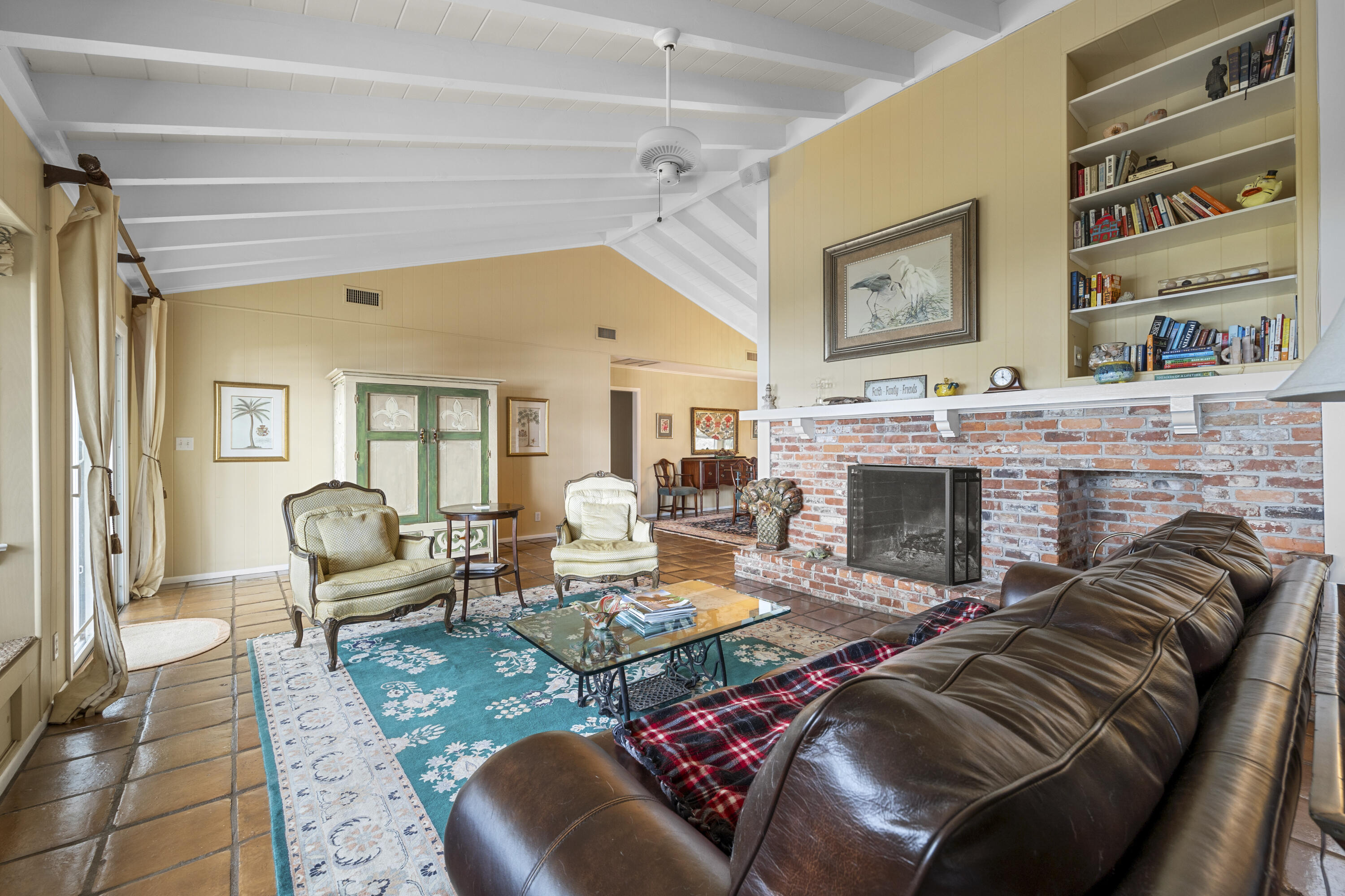 5524 Pennock Point Road Jupiter, FL 33458 - Photo 19 of 78 a living room with furniture and a fireplace