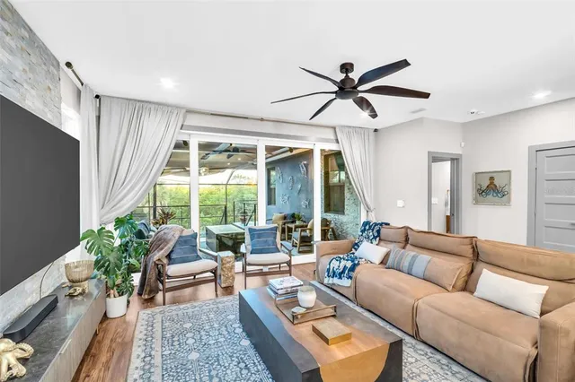 a large kitchen with a table and chairs