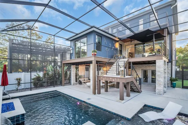 a outdoor space with patio lots of furniture and white walls