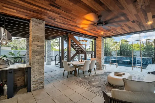 a kitchen with stainless steel appliances granite countertop a stove and a sink
