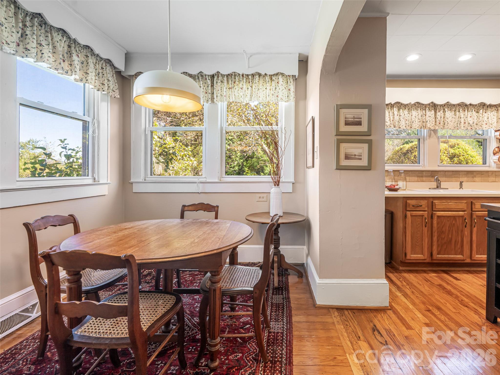 352 Justice Ridge Road Candler, NC 28715 - Photo 18 of 48 a dining room with furniture and window