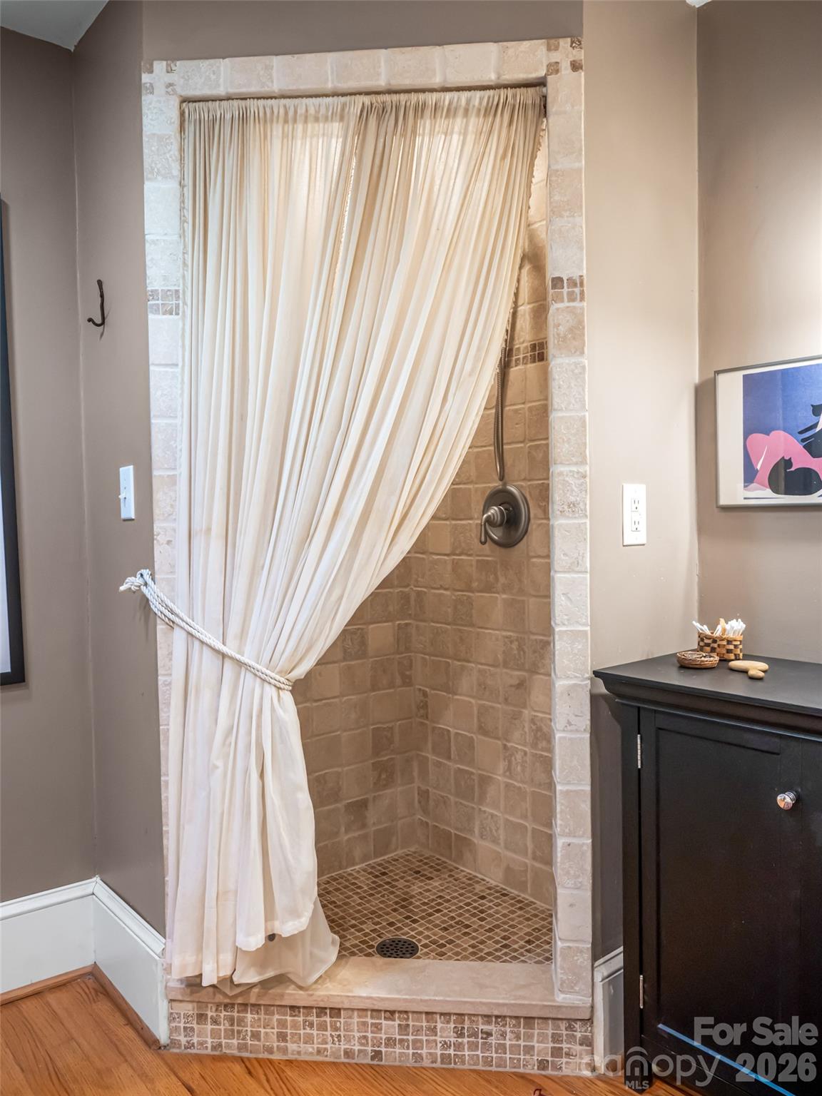352 Justice Ridge Road Candler, NC 28715 - Photo 25 of 48 a bathroom with a sink and a mirror