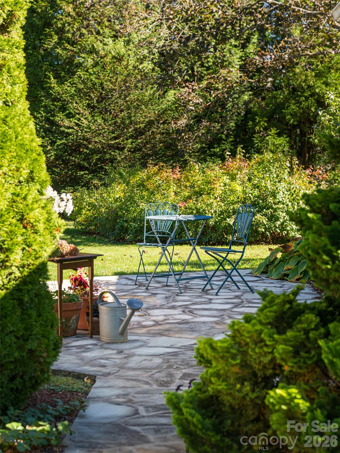 352 Justice Ridge Road Candler, NC 28715 - Photo 37 of 48 a view of a tennis ground with large trees