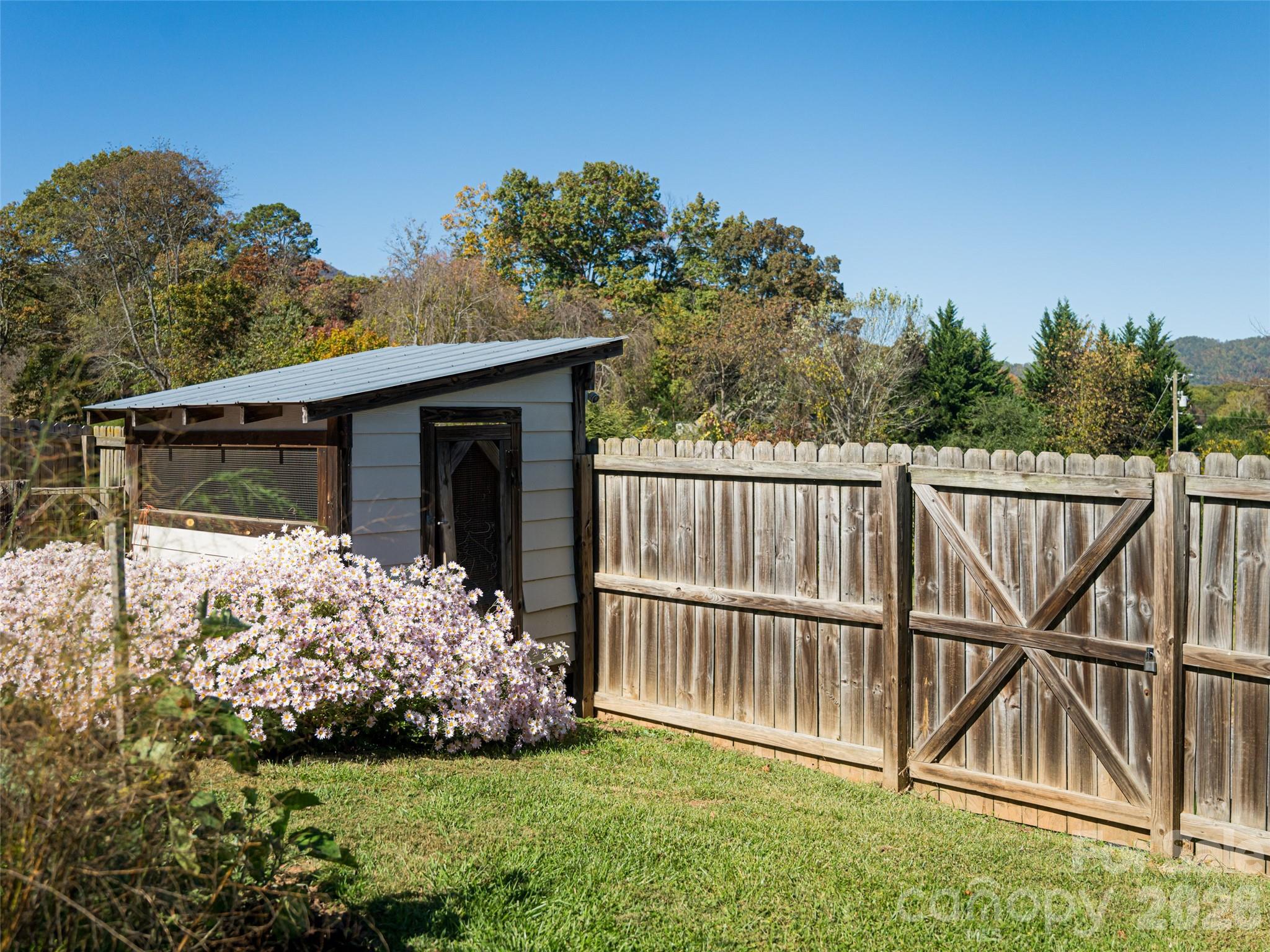352 Justice Ridge Road Candler, NC 28715 - Photo 40 of 48 a view of a backyard