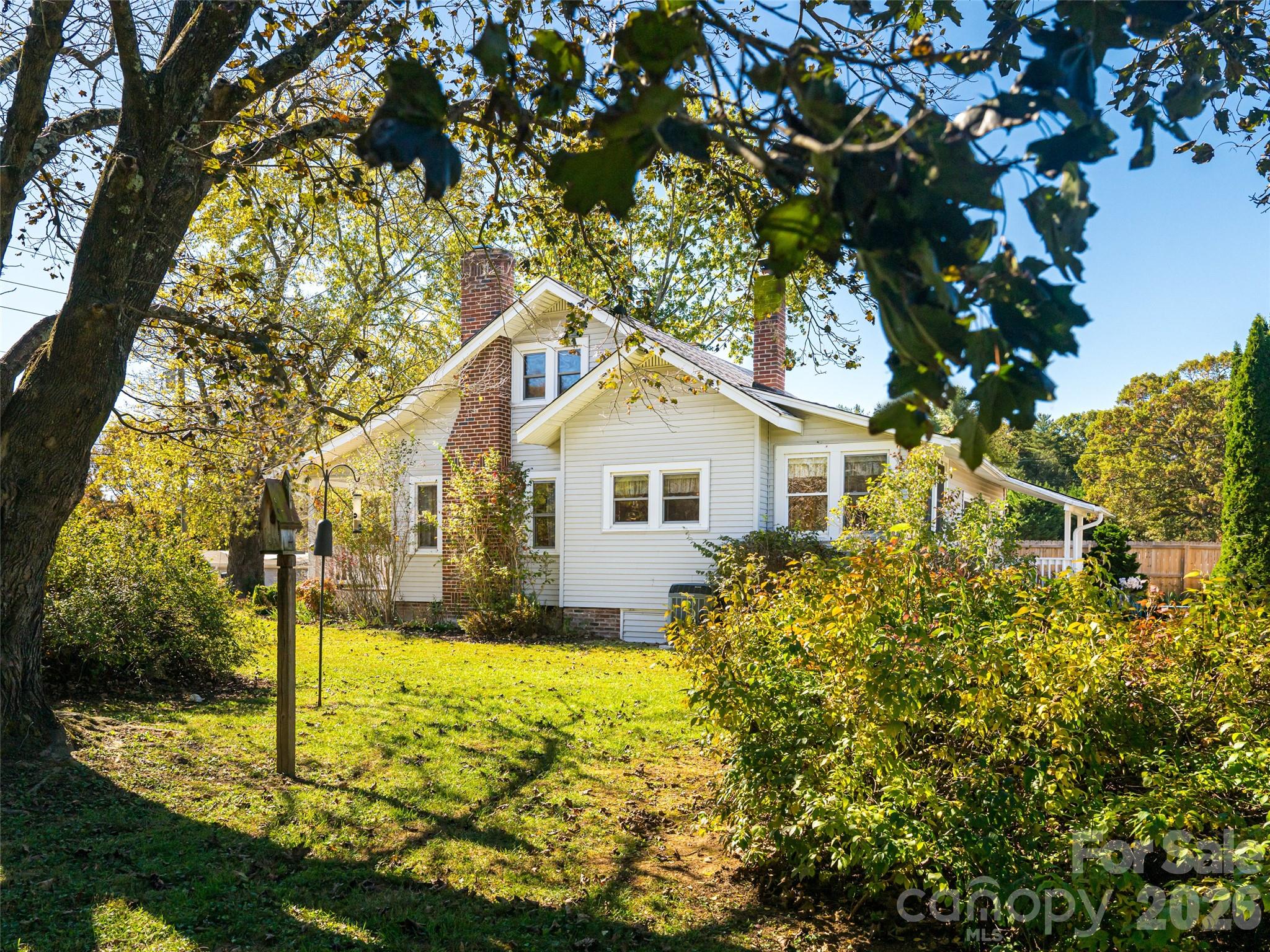 352 Justice Ridge Road Candler, NC 28715 - Photo 44 of 48 a bathroom with a sink and garden