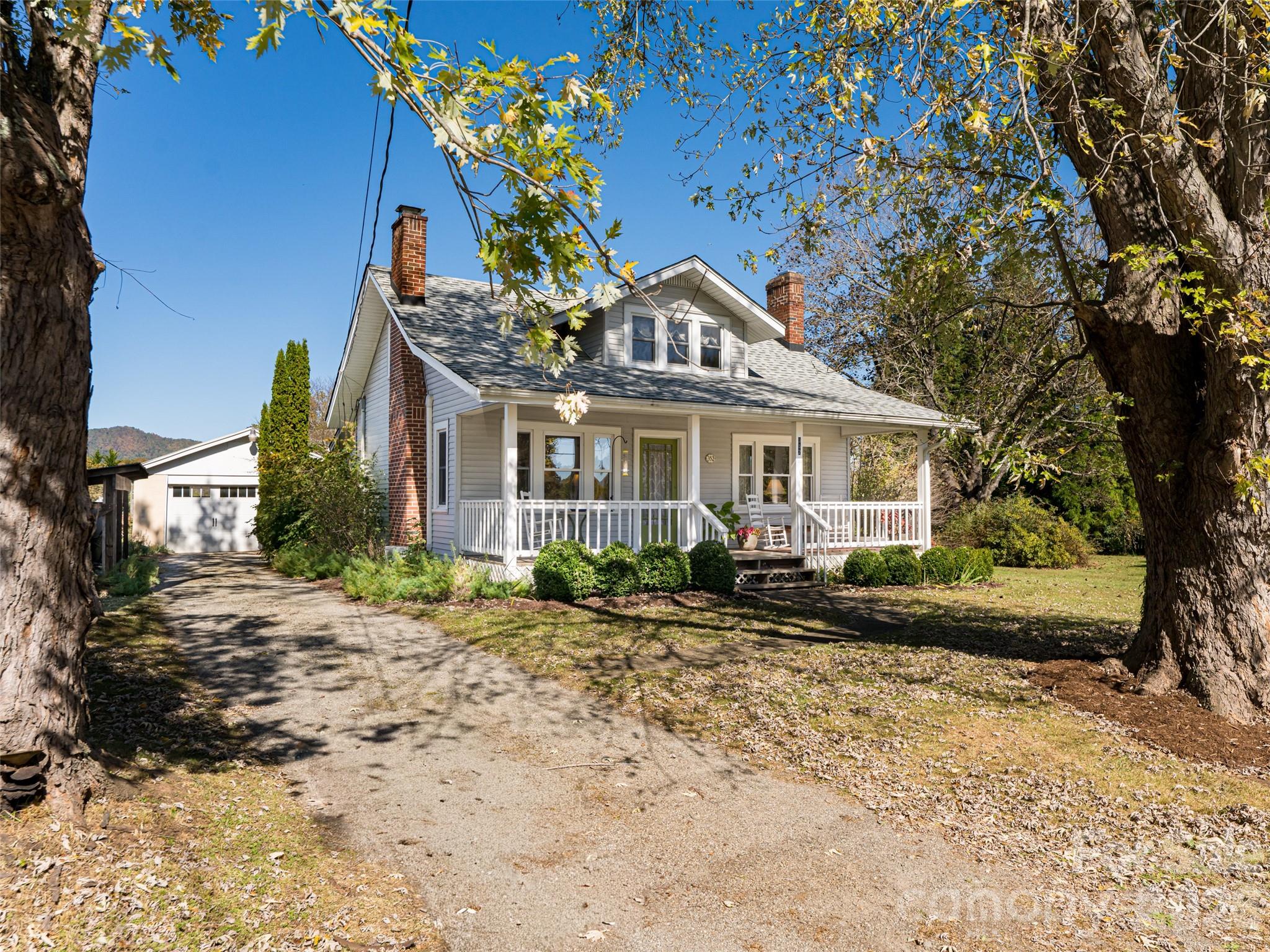 352 Justice Ridge Road Candler, NC 28715 - Photo 47 of 48 a front view of a house with a yard