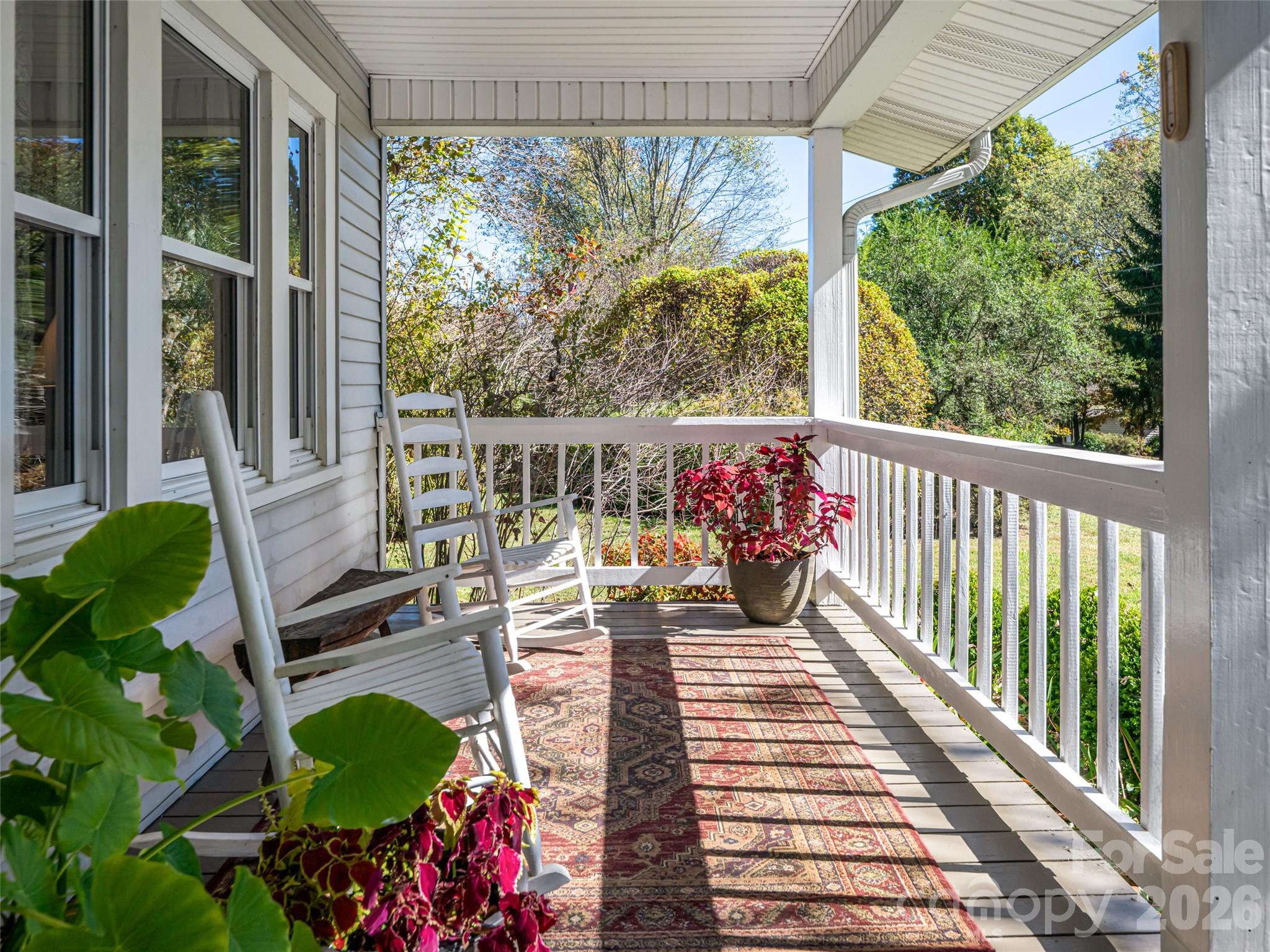 352 Justice Ridge Road Candler, NC 28715 - Photo 7 of 48 a balcony with wooden floor