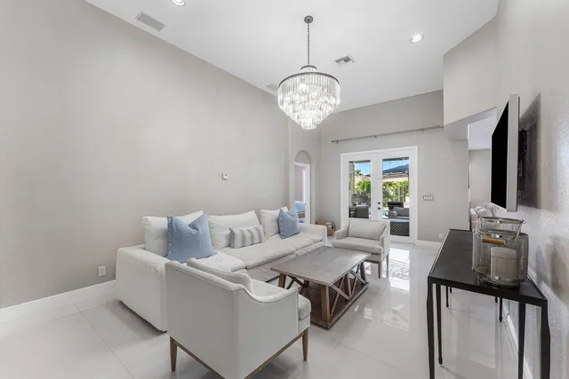 a view of a livingroom with furniture and windows