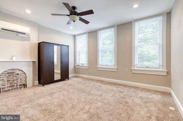 a view of a livingroom with a staircase