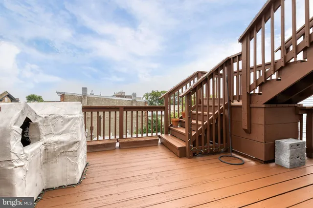 a view of city and roof deck